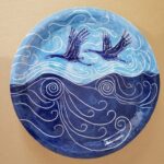 a ceramic plate created by Betsey Hurd